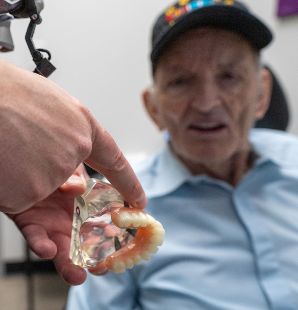 henry learning more on dental implants