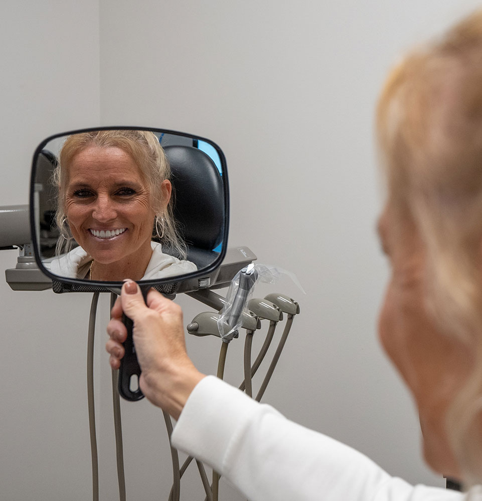 jennifer with big new smile and dental implants