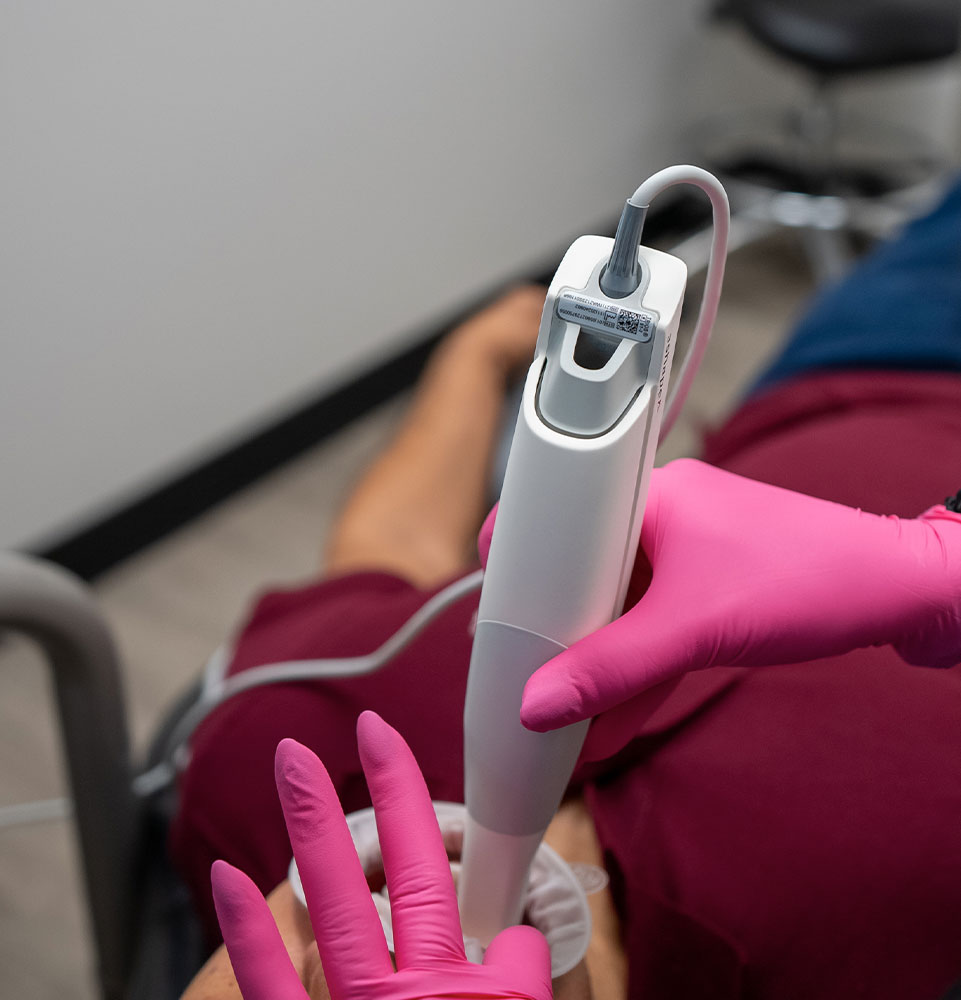 itero scanner being used on dental patient