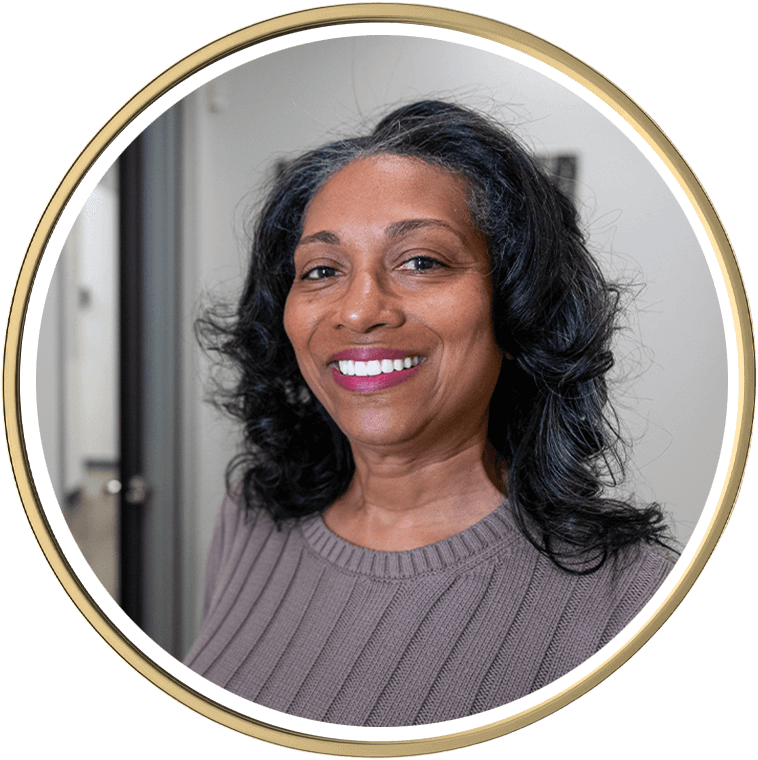 Patient smiling after dental implants