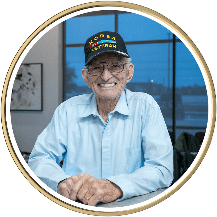 Man smiling at team member